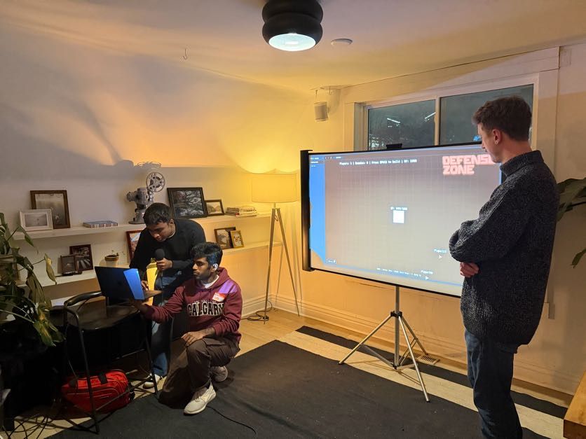 Hand controlled multiplayer game demo at Cursor Hackathon